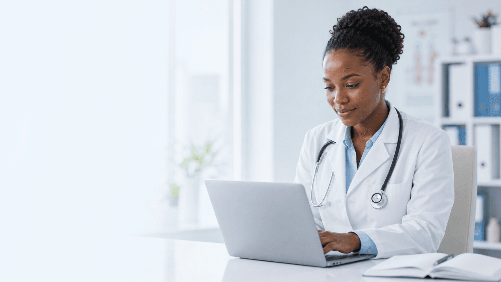 Doctor reviewing health information on a laptop